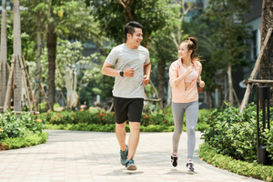Couple jogging in park